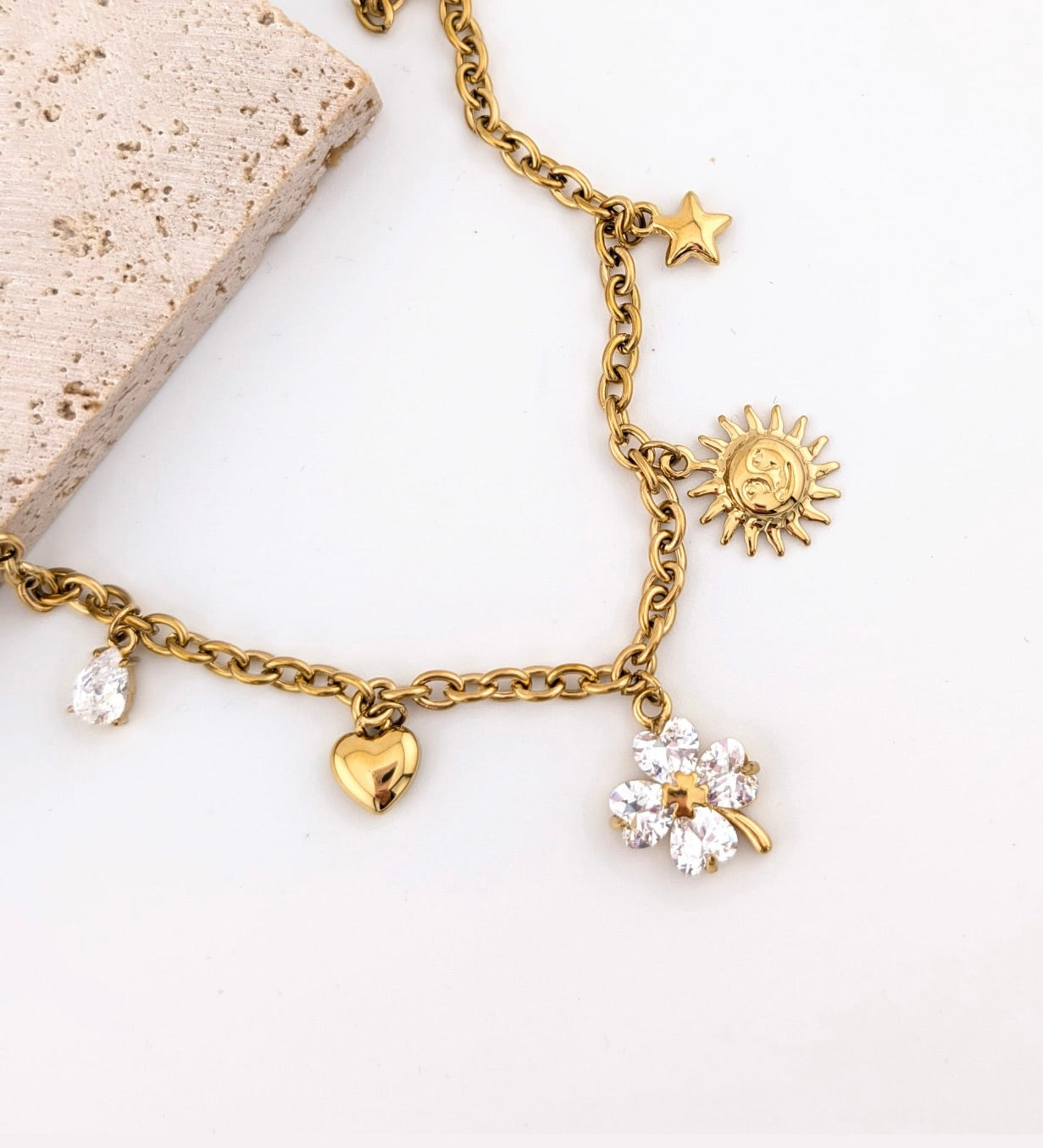 Collier charmes éclats de chance doré